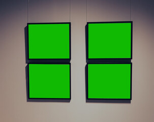 Paintings on the wall with a green background