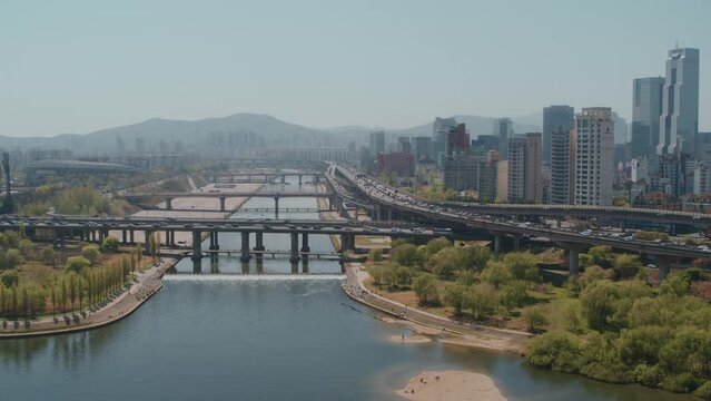 Drone View of Seoul Skyline and Han River Bridges on a Clear Day / South Korea