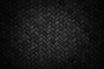 Foto op Plexiglas Old black bamboo weave texture background, pattern of woven rattan mat in vintage style. © Tumm8899