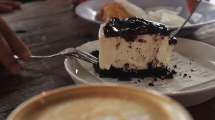pastries are served on plates, placed on the table