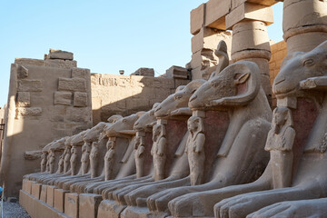 Ram-headed sphinx in Great Court of Karnak Temple. Luxor. Egypt .