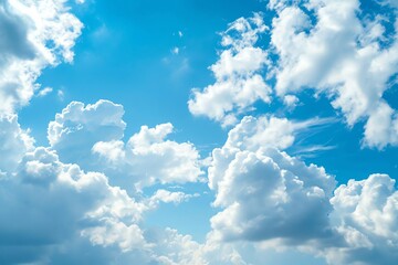 Naklejka na ściany i meble Beautiful clouds in blue sky background