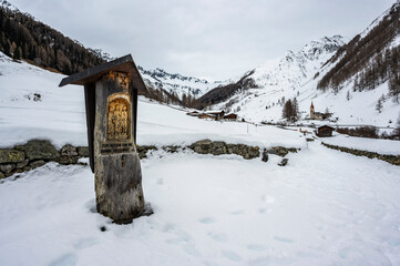 Church of Santo Spirito immersed in the snow of Val Aurina