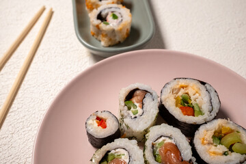 sushi with chopsticks