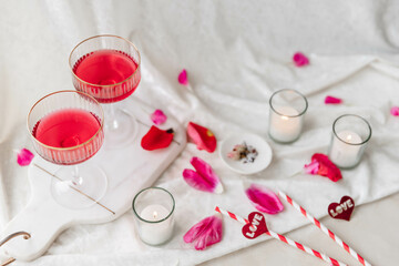 Valentine's Flatlay Cocktail, Candles and Flower Petals