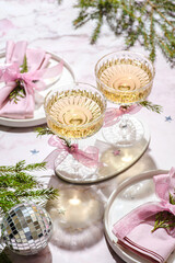 champagne glasses decorated with a bow, serving
