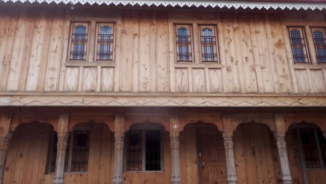 Sight of a vintage house, Garhwal architecture, carved from Deodar Cedar in rural Uttarakhand, India.