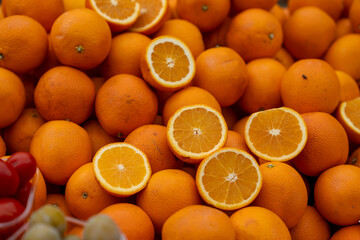 Oranges on the counter of a fruit market. Close up.