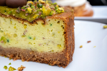 Pistachio and chocolate cheesecake with simple presentation