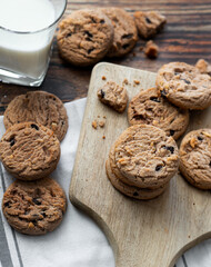 Oatmeal cookies with pieces of chocolate. on a wooden background. snack