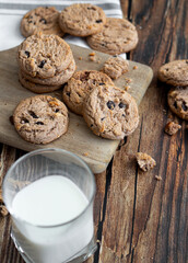 Oatmeal cookies with pieces of chocolate. on a wooden background. snack