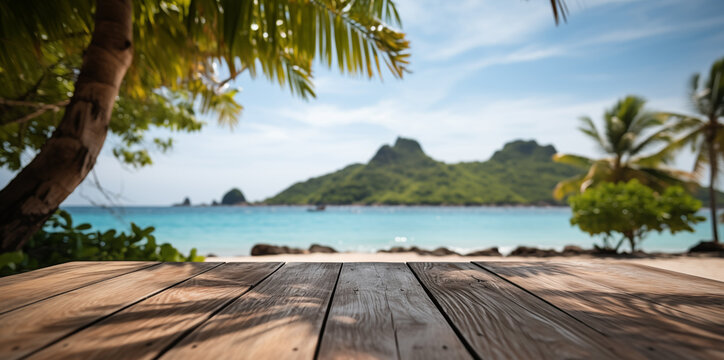 Empty wooden table with tropical beach theme in background