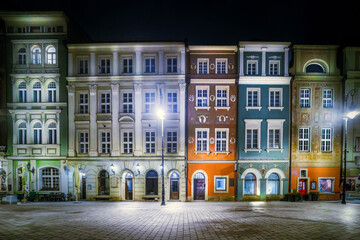 old market square in the center of a european city at night. Bright illumination. Urban tenement...