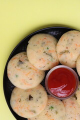 Rava Idli or semolina idli or steamed cakes made with semolina, yogurt, spices, veggies, an Indian breakfast