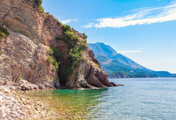 Rocky coast of the Adriatic Sea in Montenegro . Public Stone Beach in Budva