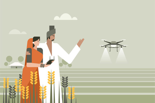 An Indian farmer along with his wife using a drone in the agricultural field