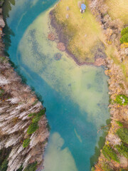A drone view of the winding river. An aerial view of an autumn landscape.