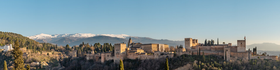 Fototapeta na wymiar Panoramic view of the Alhambra in Granada with the Sierra Nevada mountain in the background.