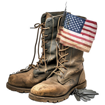 Old military combat boots with the American flag and dog tags