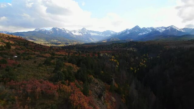 Mount Sniffels Wilderness Colorful Colorado Million Dollar Highway Dallas Range aerial cinematic drone cloudy autumn fall colors San Juans Ridgway Ralph Lauren Ranch 14er fast forward up reveal motion