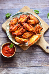
 Crispy  deep fried   chicken 
 wings with cornflakes , ketchup and french fries . Breaded  with cornflakes chicken   wings. Junk fast food