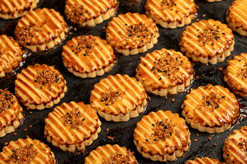 Sesame cookies. Fresh sesame cookies on a white background