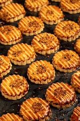 Sesame cookies. Fresh sesame cookies on a white background. Close up