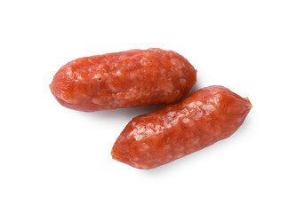 Thin dry smoked sausages isolated on white, top view