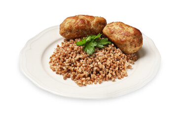 Plate with tasty buckwheat, fresh parsley and cutlets isolated on white