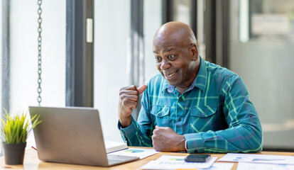 Business senior man 60 years old using laptop computer in office. Happy middle aged man,...