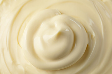 Fresh mayonnaise sauce as background, closeup. Top view