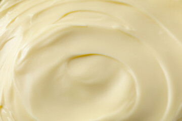 Fototapeta na wymiar Fresh mayonnaise sauce as background, closeup. Top view