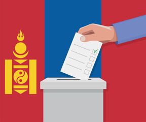 Mongolia election concept. Hand puts vote bulletin