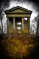 Thea abandoned rotten morgue with coffins.