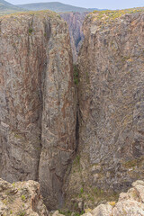 Deep gorges in the north rim of the Black Canyon of the Gunnison at Rock Point on the south rim