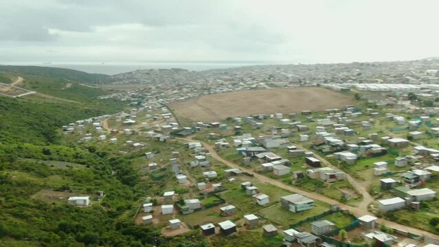Drone aerial of huge informal settelment at a small coastal town in South Africa