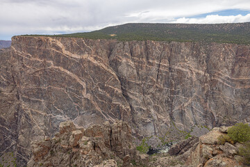 Side view of the Painted Wall seen from Cedar Point on the south rim of the Black Canyon of the...