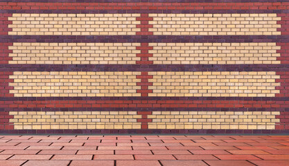 Ziegelmauer aus verschiedenfarbigen Ziegeln mit Bodenplatte