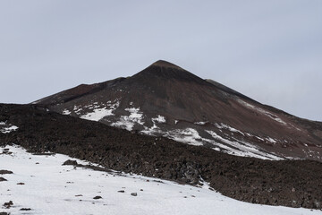 Etna Volcano in Sicily, Italy, in winter conditions with snow and ice