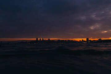 Panoramic view of the city of Dnipro during sunset or sunrise. Amazing sunset at Dnipro river with...