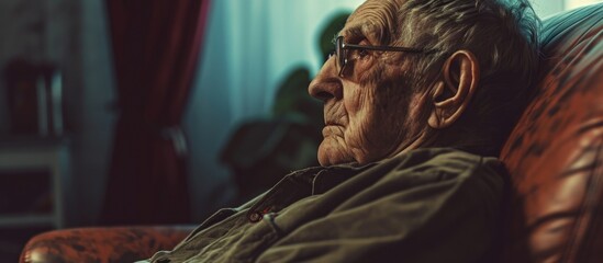 Retired man feeling down, alone in nursing home.