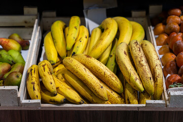 bananas in the fruit section, Bunch of ripened bananas at grocery store