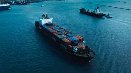 logistic cargo container ship sailing in sea to import export goods and distributing products to...