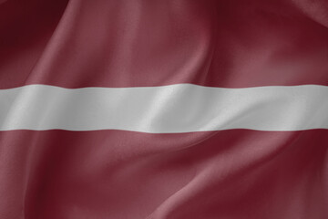 Latvia waving flag close up fabric texture background