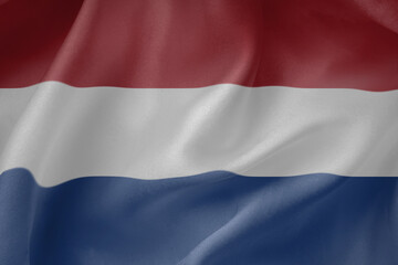 the Netherlands waving flag close up fabric texture background