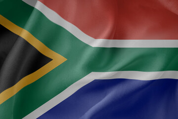South Africa waving flag close up fabric texture background