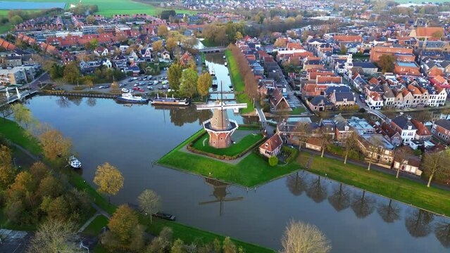 Aerial view: City of Dokkum with the windmill in the center of the town. Friesland, Netherlands.