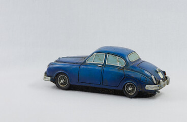 Isolated blue vintage car model