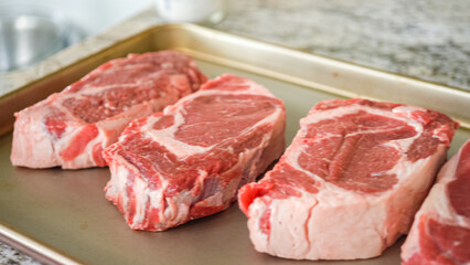 Young Man Enthusiastically Preparing Dinner in Modern Kitchen