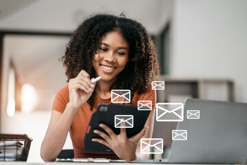 Email notification concept, Female use smartphone and laptop receive message alert in the mailbox.